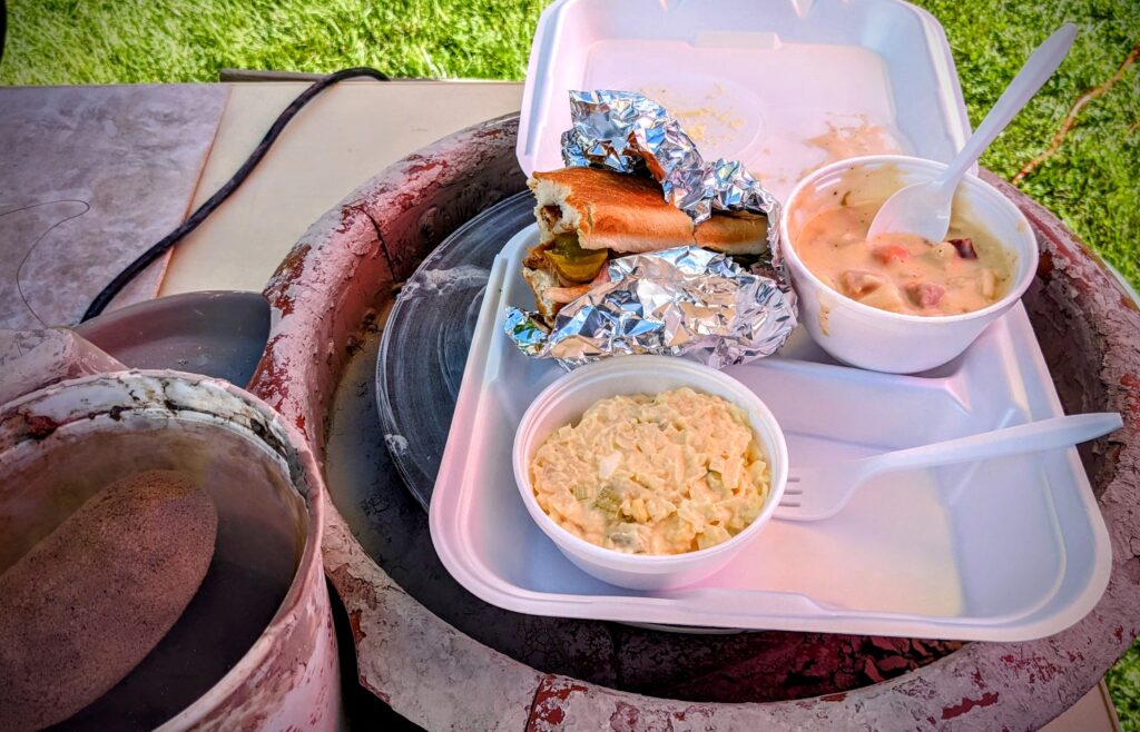 middlebury fall festival lunch: rib sandwich, soup, potato salad on a pottery wheel